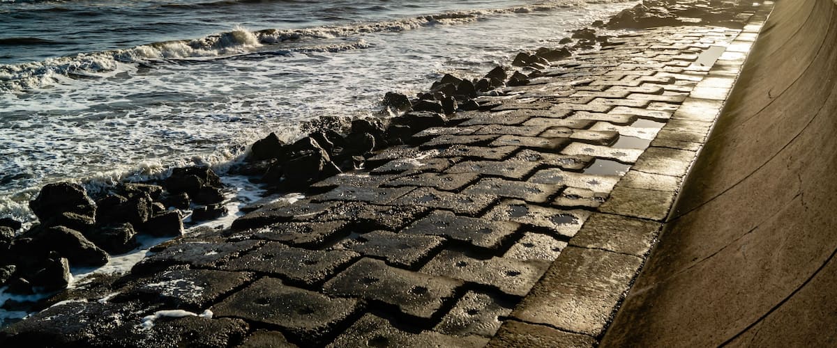 Evening sun illuminates the Seawall at Galveston, Texas