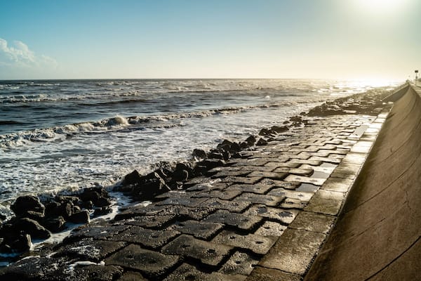 Evening sun illuminates the Seawall at Galveston, Texas