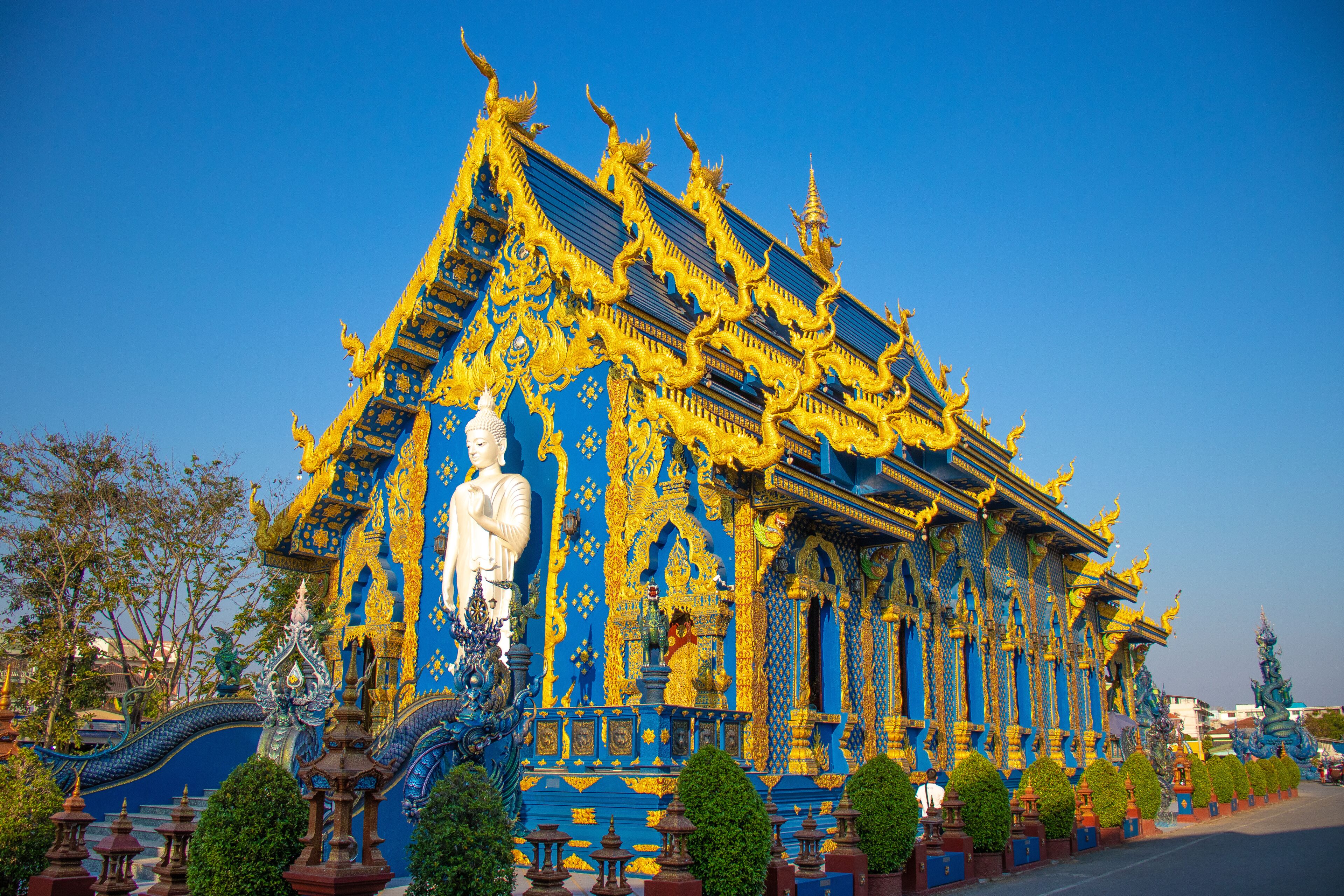A beautiful view of Wat Rong Suea Ten, the Blue Temple at Chiang Rai, Thailand.