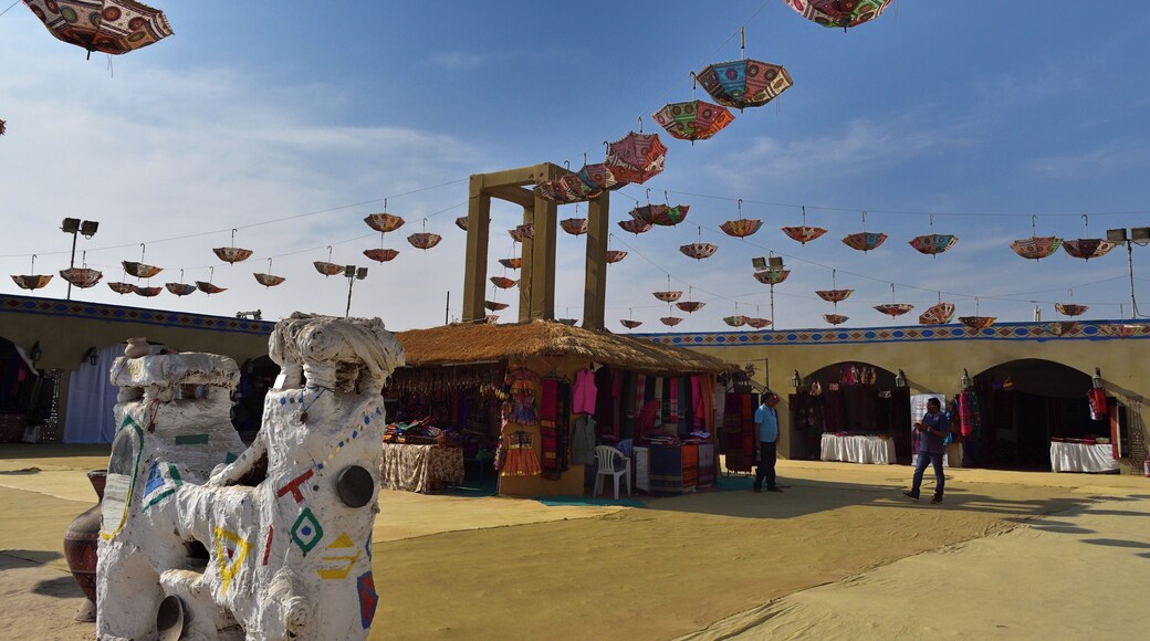 The shopping arcade at the tent city adorned by a canopy of colourful umbrellas