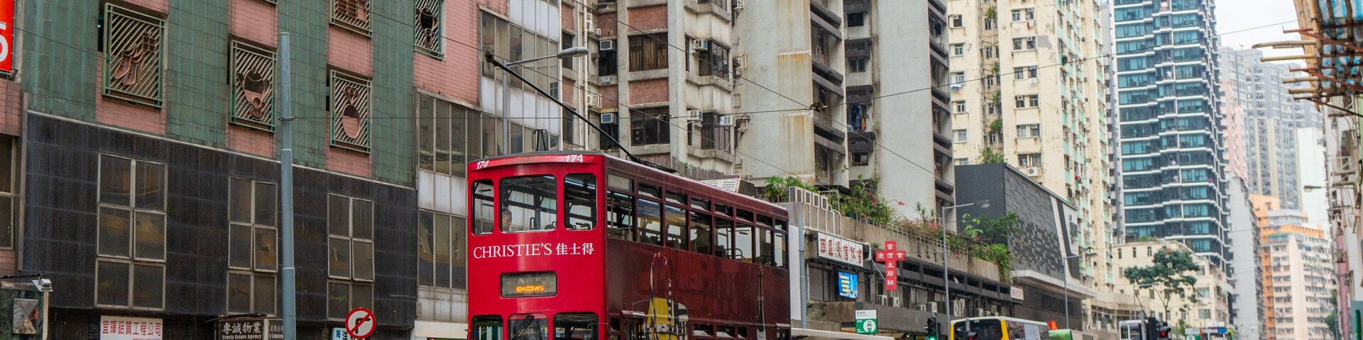Sai Wan showing railway items, street scenes and a city