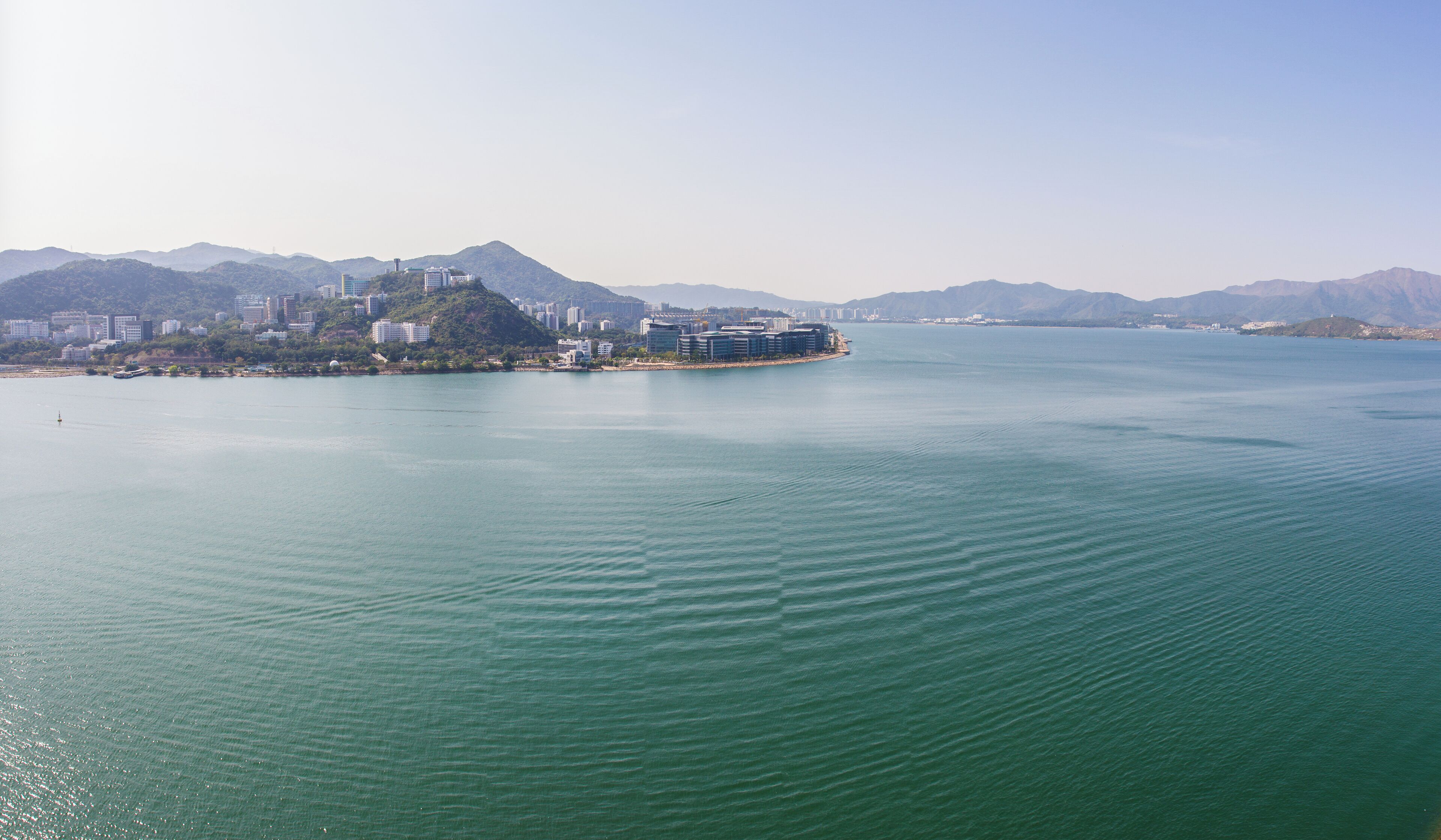 I have always wanted to do large format photography, but the cost for the cameras are somewhat prohibitive for me. But I believe that if I have the will, I can do it. So I have been hacking this by stitching 7D captures together for a view which is beyond which a wide angle lens can capture. This one shows the view from SML Universe HKG, and is the subject for my 寧 Serenity photography series. While the single frame captures can also cover so much, by panning the camera in portrait mode set to 17mm focal length, I am able to cover a large area of the sky as well as the sea. The sea tiling is imperfect, because it moves. This done handheld, so the seams might not be perfect. Also my window does not open as wide as it could, so I actually had to use two different windows to get this. I wish that I can get roof access but unfortunately not. I would consider going to up to the mountain next to me to see if I can get a better view in the future. SML Data + Date: 2013-03-05 14:30:27 GMT+0800 + Dimensions: 5101 x 2975 + Focal Length: 17 mm + Camera: Canon EOS 7D + Lens: Canon EF 17-40 f/4L USM + Panorama FOV: 120 degree horizontal, 72.5 degree vertical + Panoramic Projection: Cylindrical + GPS: 22°25'10" N 114°13'25" E + Location: SML Universe HKG + Subject: 香港中文大學 + 科學園 + 大埔工業村 + 八仙嶺 + 吐露港 The Chinese University of Hong Kong + Science Park + Tai Po Industrial Estates + Tolo Harbour + Serial: SML.20130305.7D.26344-SML.20130305.7D.26351-SML.Pano.Cylindrical-120x72.5 + Workflow: Hugin 2012, Lightroom 4 + Series: 寧 Serenity, 全景攝影 Panoramic Photography “香港中文大學 + 科學園 + 大埔工業村 + 八仙嶺 + 吐露港 The Chinese University of Hong Kong + Science Park + Tai Po Industrial Estates + Tolo Harbour” / 香港全景之寧 Hong Kong Serenity Panorama / SML.20130305.7D.26344-SML.20130305.7D.26351-SML.Pano.Cylindrical-120x72.5 / #寧 #serenity #SMLSerenity #全景 #Pano #SMLPano #CCBY #SMLPhotography #SMLUniverse #SMLProjects / #中國 #中国 #China #香港 #HongKong #攝影 #摄影 #photography #山水 #landscape #CUHK #SciencePark #TaiPo #PatSinLeng #ToloHarbour