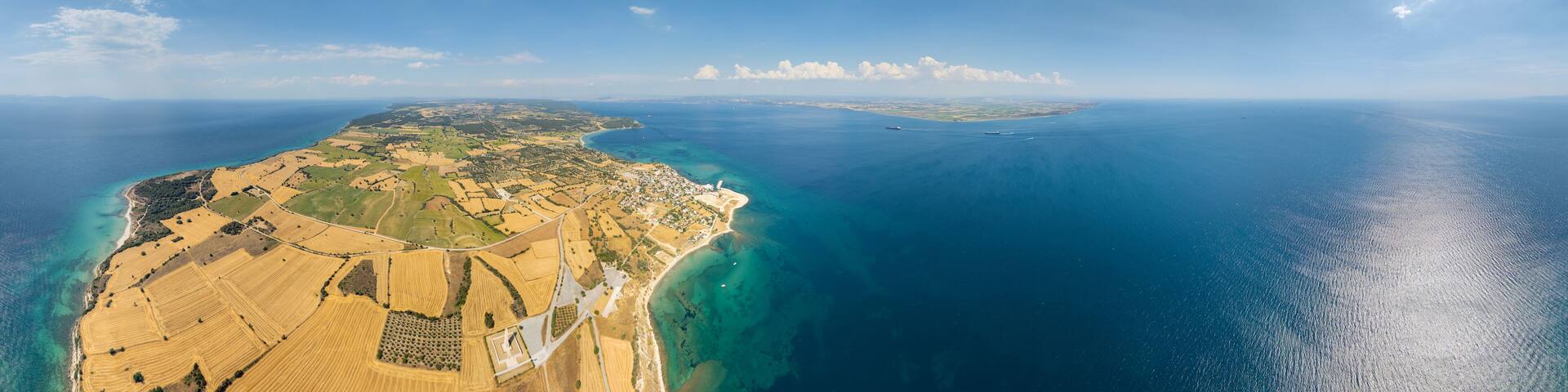 Seddulbahir, Turkey. Cylindrical panorama of Dardanelles Strait entrance at Cape Helles with Mehmetcik Lighthouse and Gallipoli Peninsula coast. Panorama 360. Aerial view