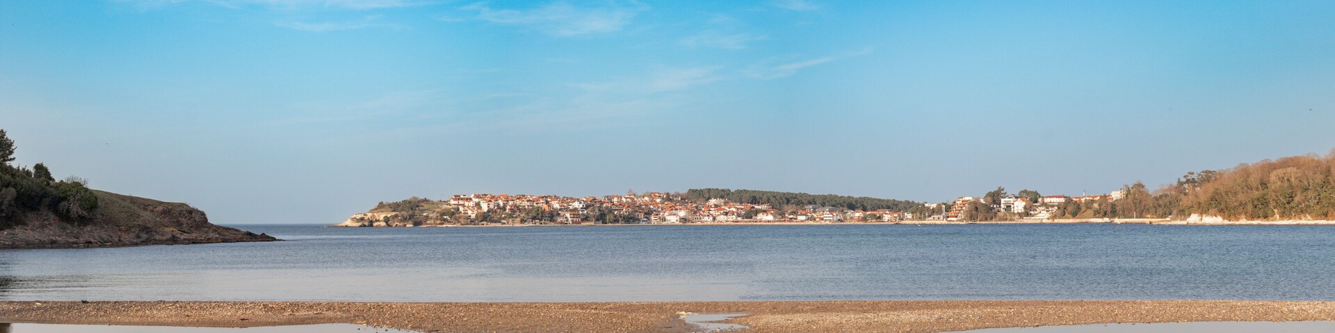 A distant panoramic view of Kerpe in a beautiful sunny weather with a simple view of the sea. Kerpe, Kocaeli, Türkiye.