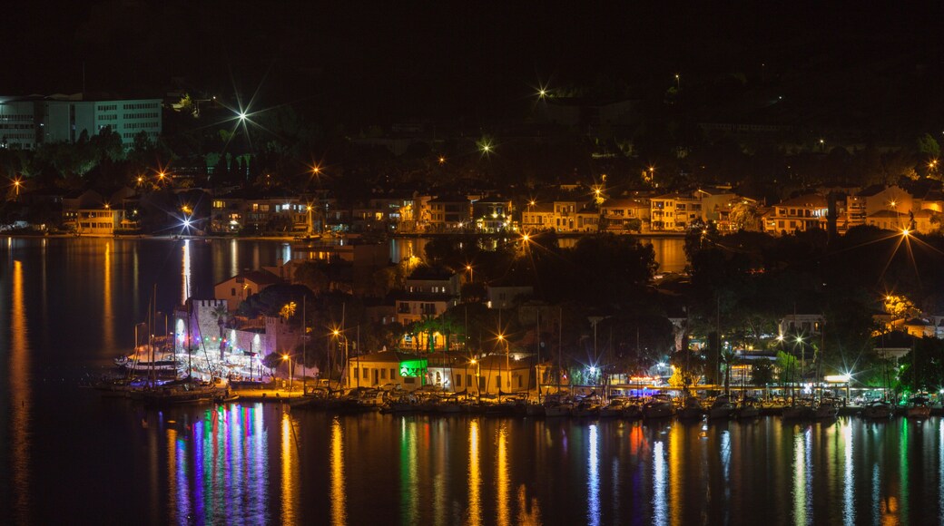 Nice night view of old Phokaia (in TR: eski foca) located in Izmir, Turkey. Great reflections of lights over the sea. Night cityscape concept. Reflection in the sea.