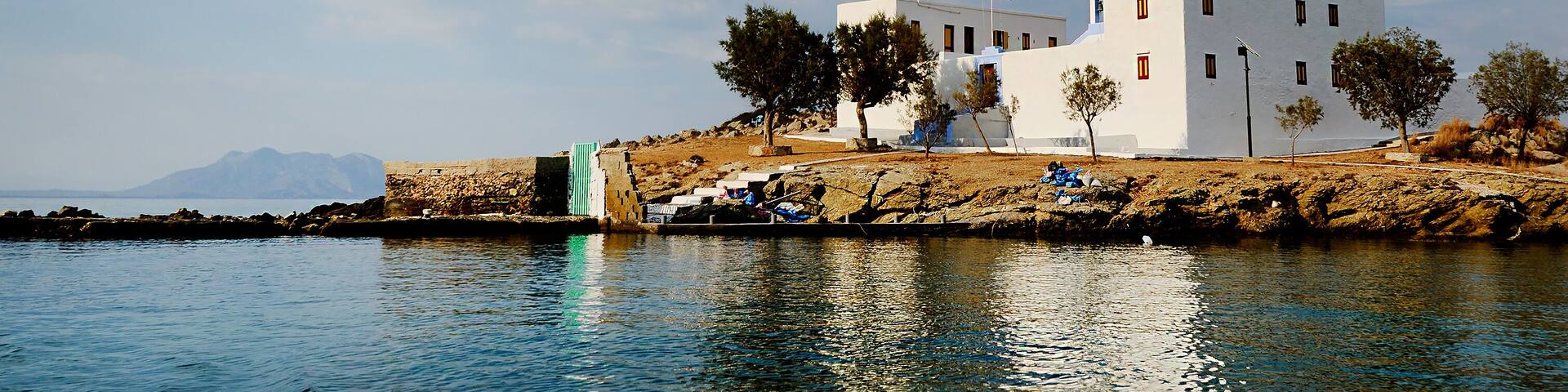 The monastery of Agios Emilianos in the bay of Skomisa on the northwest coast of the Greek island of Symi in the Dodecanese archipelago