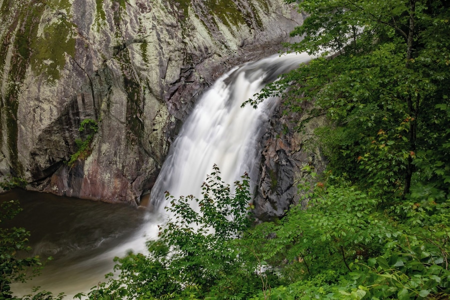 A nice waterfall in the Wilson Creek area of the Pisgah National Forest. After a good rainfall this waterfall really puts on a good show. It also has a popular swimming hole just below the falls but it is very steep getting down to the creek. For a video of the hike to this waterfall, please visit: https://www.hdcarolina.com/episode/harper-creek-falls