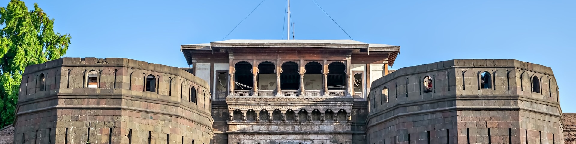Historical , ancient, stone made monument named Shaniwar Wada in Pune. Text in local language is name" Shaniwar Wada".