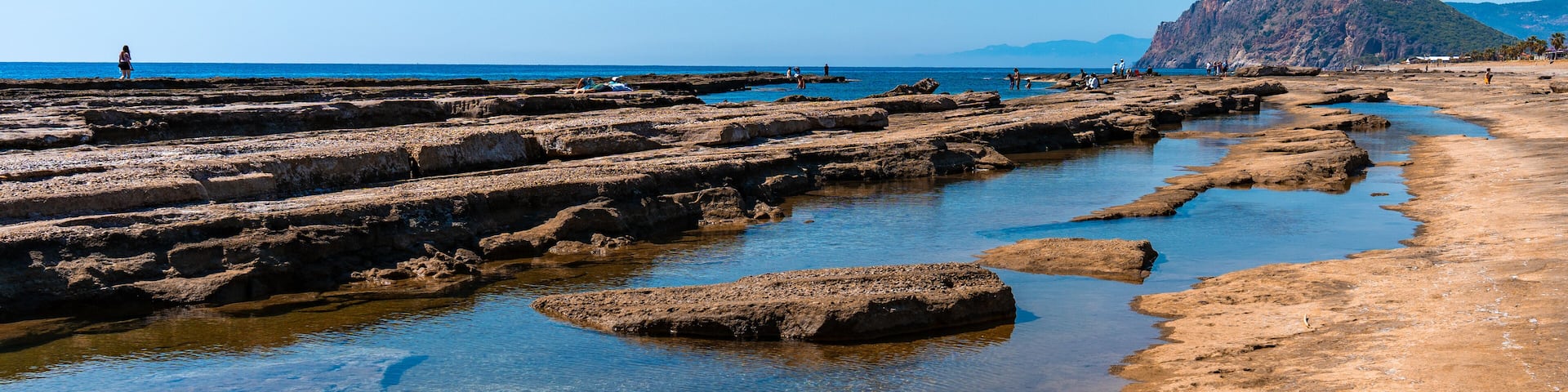 Koru Beach in Gazipasa: Serene Rocky Coast and Clear Waters