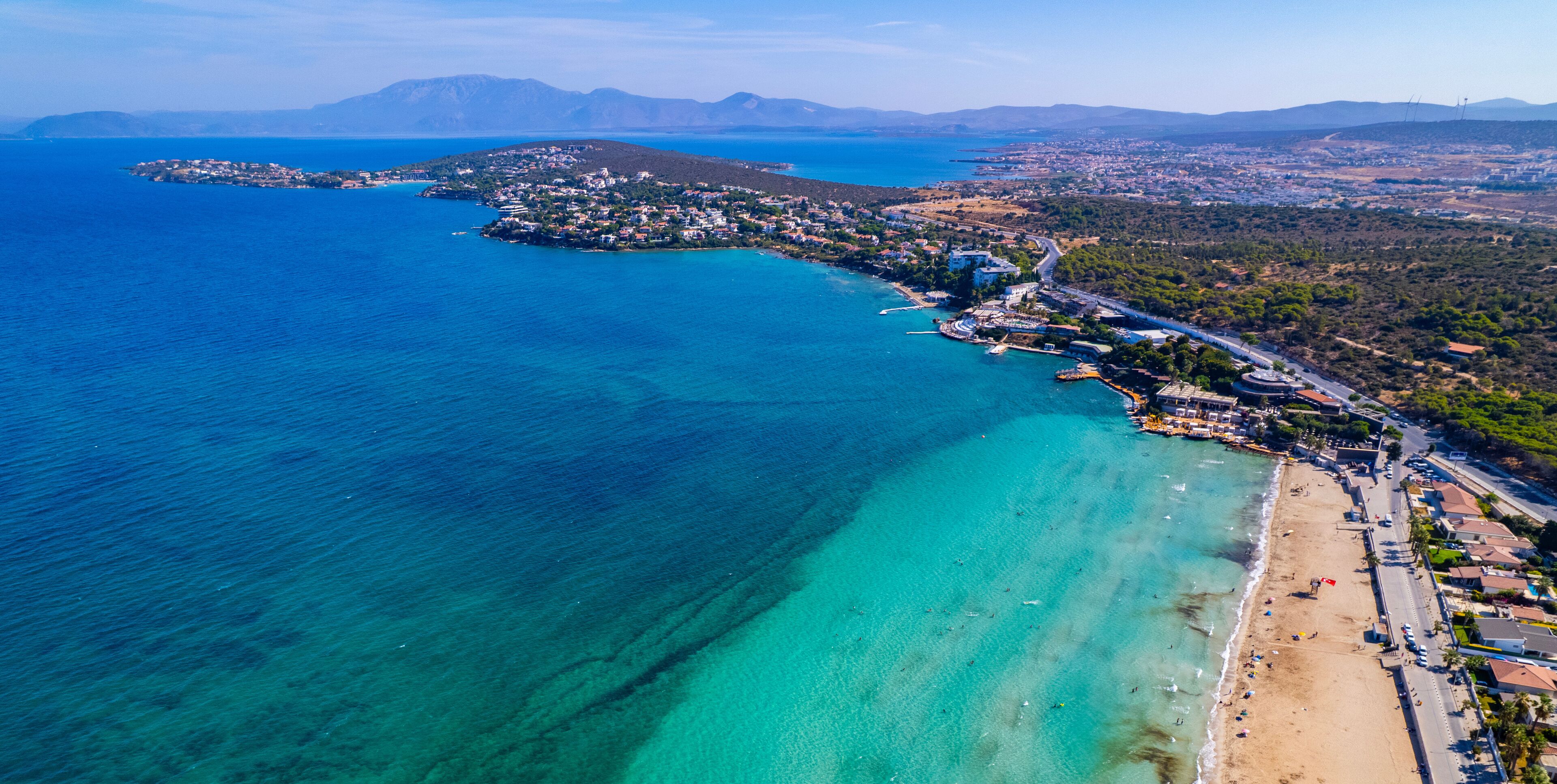 Ilica Beach in Alacati. Cesme District, Izmir, Turkey. Beautiful turquoise sea view in Cesme. Drone shot.
