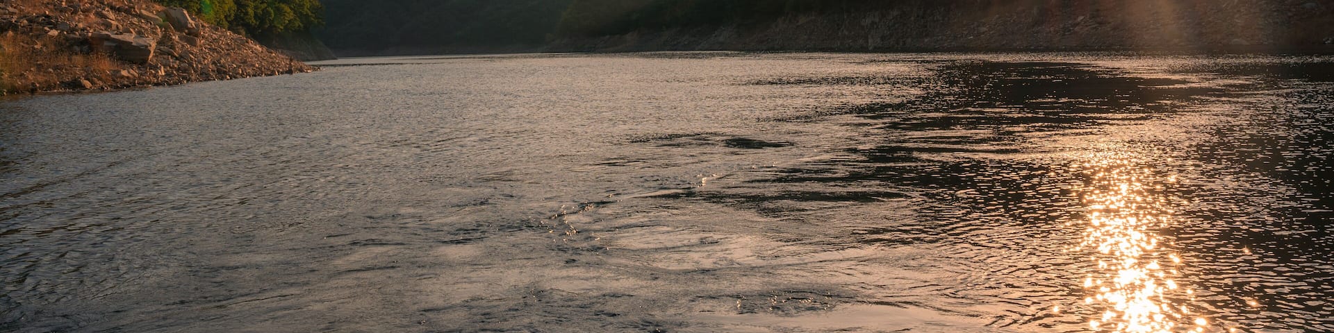 Sunset over Soyanggang Dam during cruise ship on Soyang river in the valley at Chuncheon, South Korea