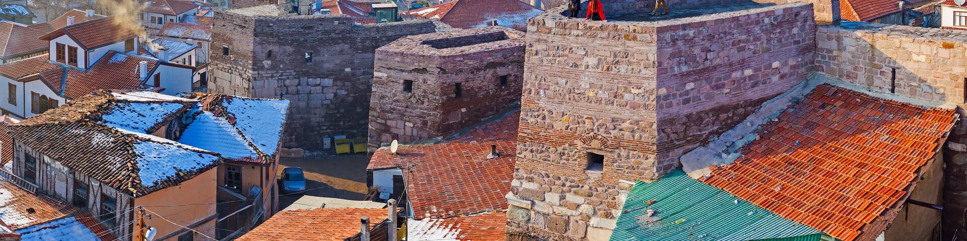 The sunset cityscape with the old rampart of Ankara Castle, Turkey
