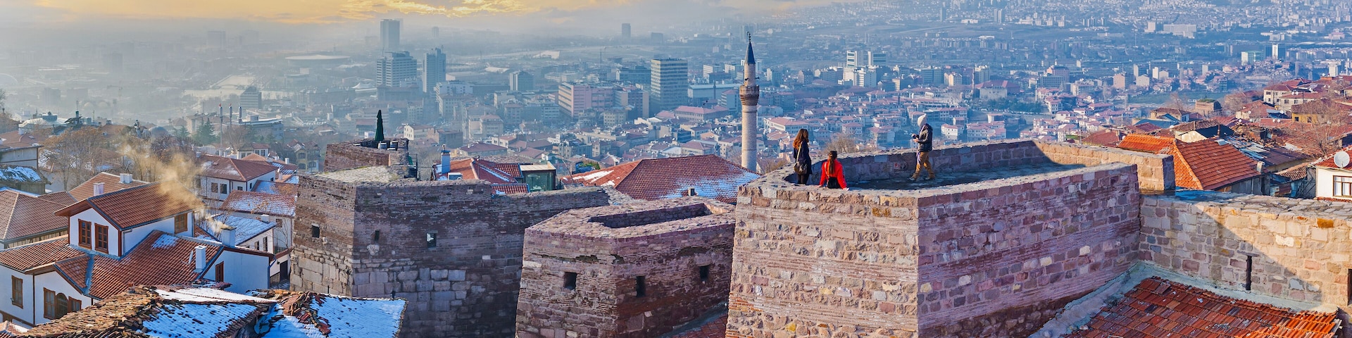 The sunset cityscape with the old rampart of Ankara Castle, Turkey