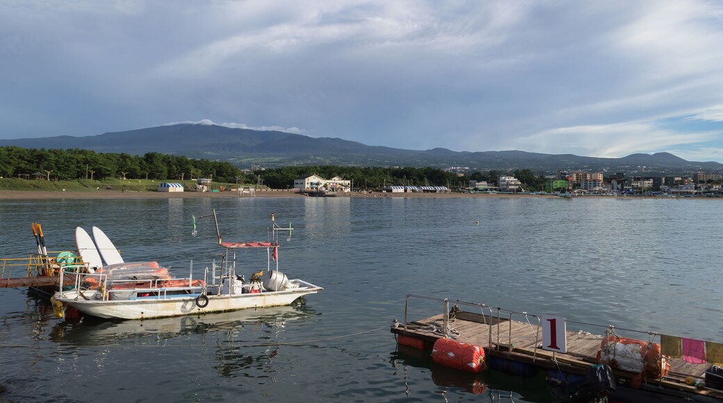 moored boat and pier near Iho Tewoo Beach on Jeju island