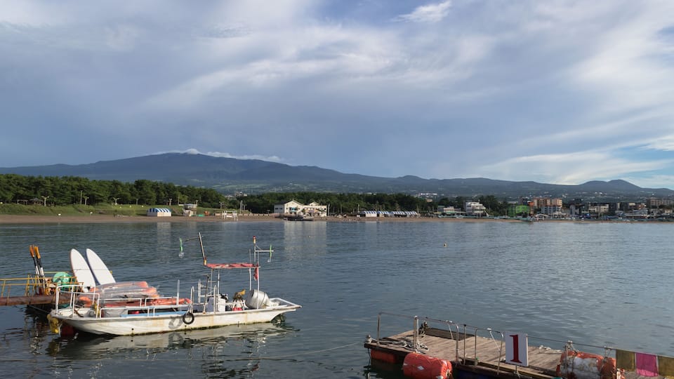 moored boat and pier near Iho Tewoo Beach on Jeju island