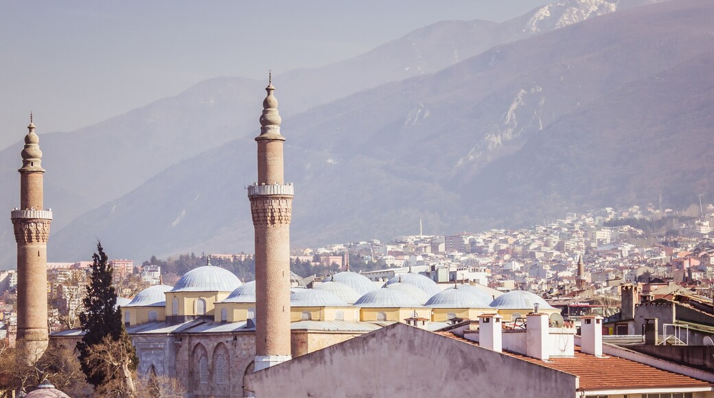 Bursa Grand Mosque and Uludag mountain landscape view.