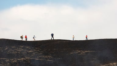 Nicaragua which includes hiking or walking and mountains as well as a large group of people