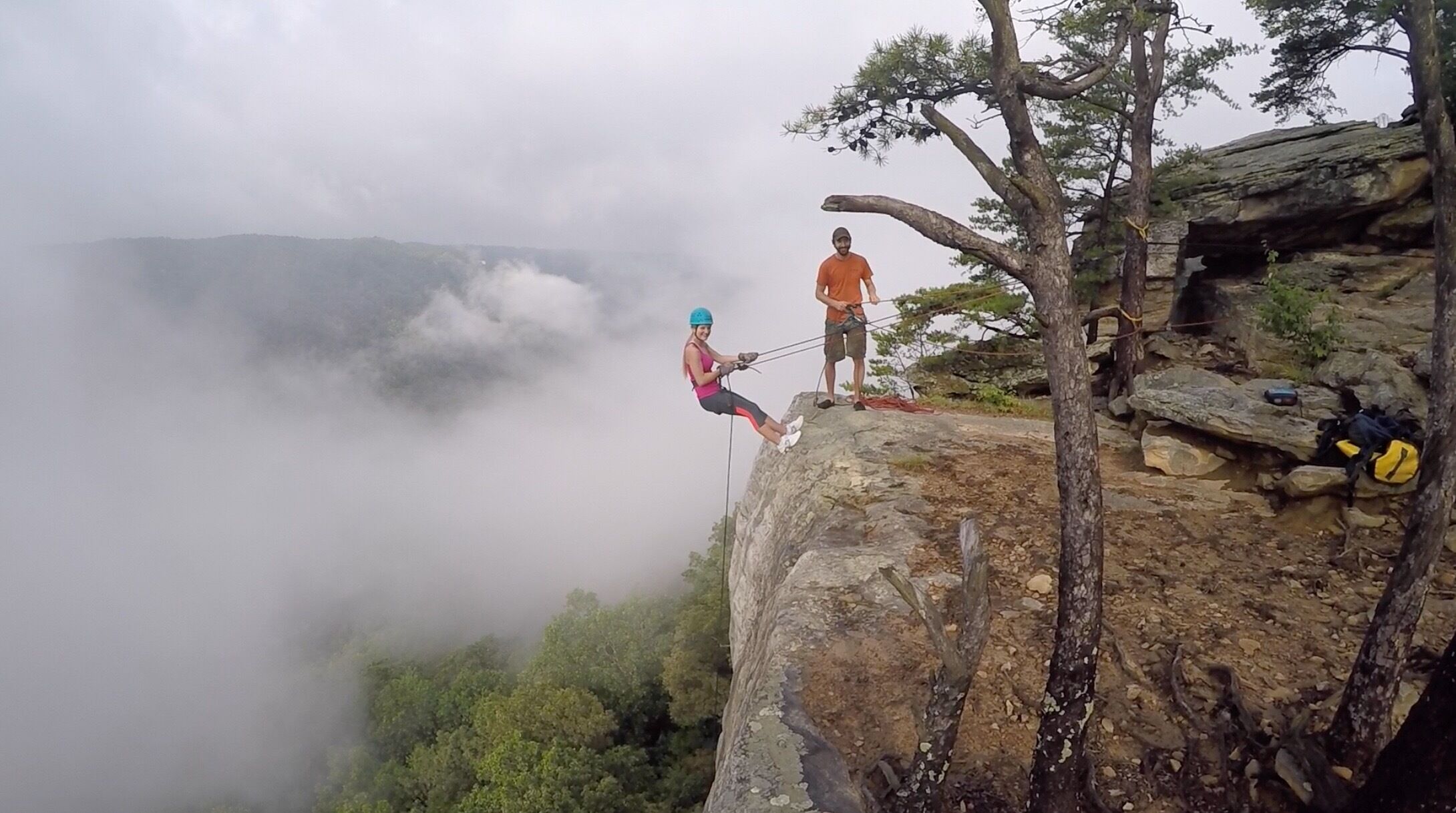 Rappelling into the fog 