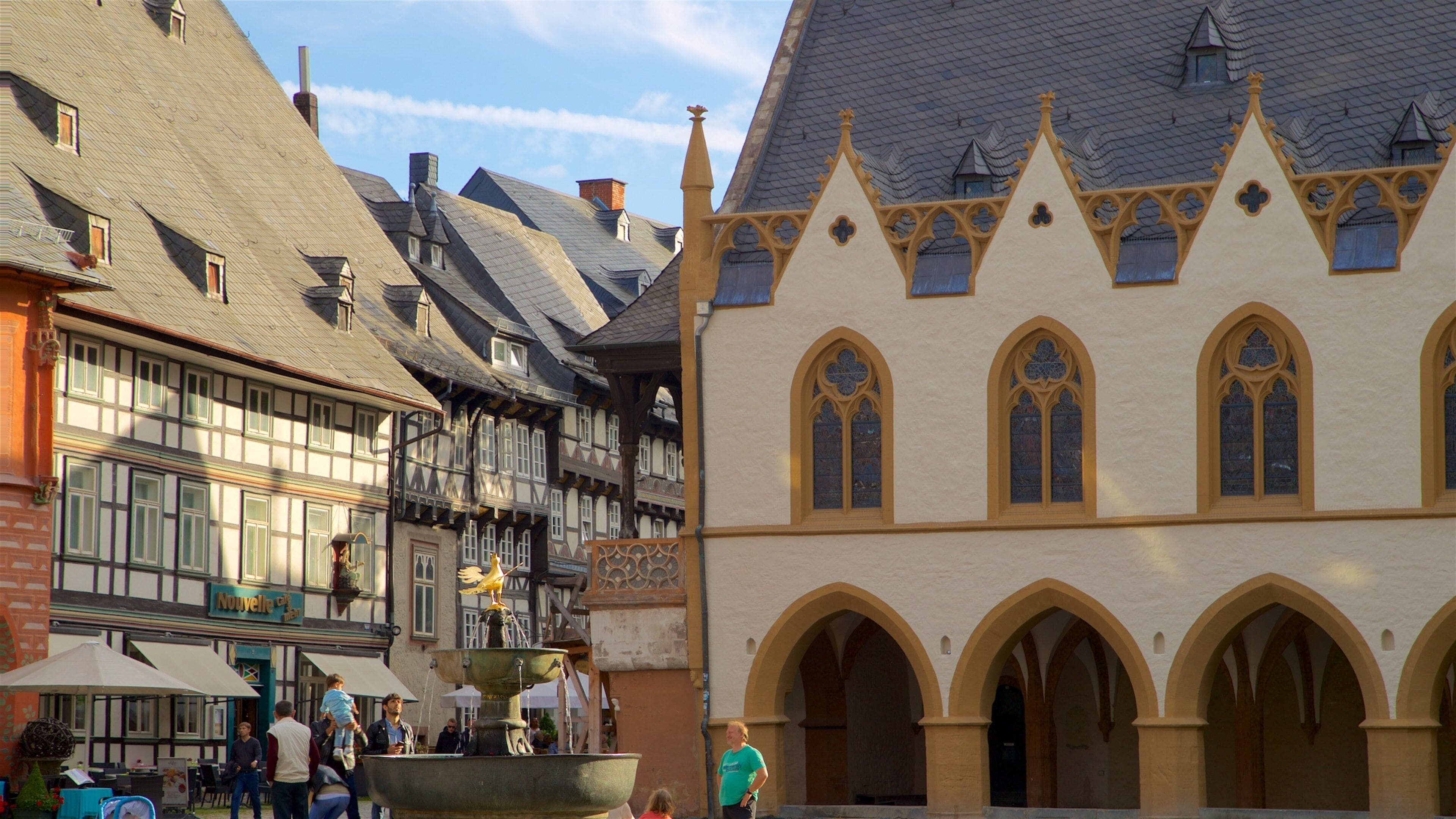 Goslar which includes heritage elements, street scenes and a fountain