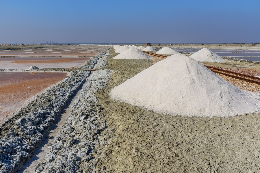 Heaps of salt along old narrow gauge railway on Sambhar Salt Lake. India