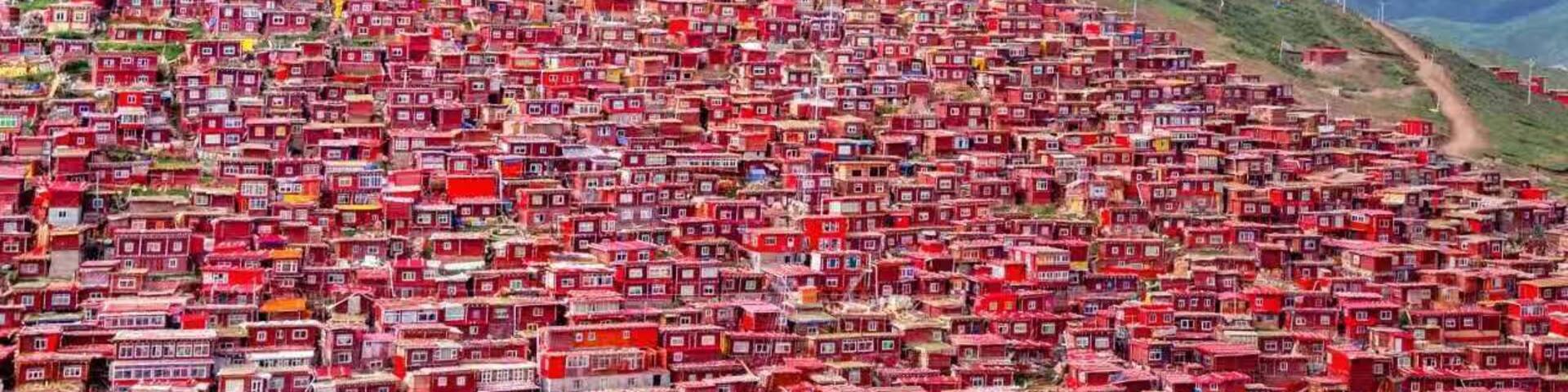 #LifeAtExpedia
Larong Wuming Buddhist Institute in Sertar, Sichuan; perched on a hillside of 4000 metres above sea level, thousands of RED cabins are the homes of Buddhist monks and nuns.