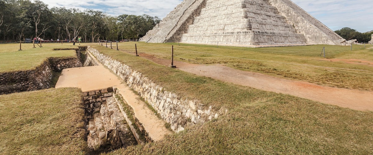 FunFact: Possibly the best known construction on the site is Kukulkan's Pyramid. This pyramid was built for astronomical purposes and during the vernal equinox (March 20) and the autumnal equinox (September 21) at about 3pm the sunlight bathes the western balustrade of the pyramid's main stairway. This causes seven isosceles triangles to form imitating the body of a serpent 37 yards long that creeps downwards until it joins the huge serpent's head carved in stone at the bottom of the stairway. #Adventure