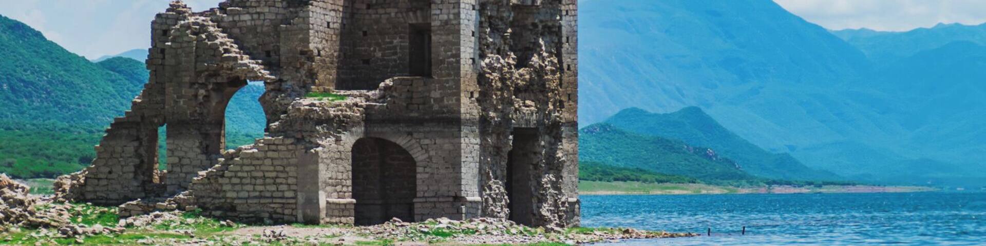 Every year during the dry season, the levels on the Novillo Dam go down enough to reveal some of the remains of Batuc, one of the 3 towns that were flooded during the construction.