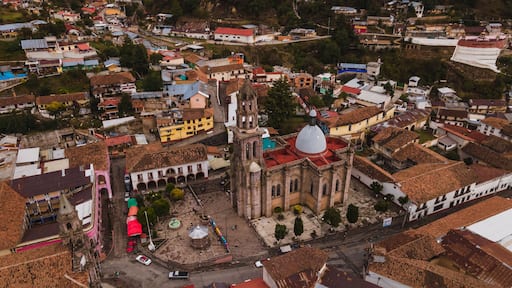 Aerial photographs of the exteriors, details of the Cathedral of Angangueo, Michoacan, Mexico, as well as some houses and old buildings of the town.