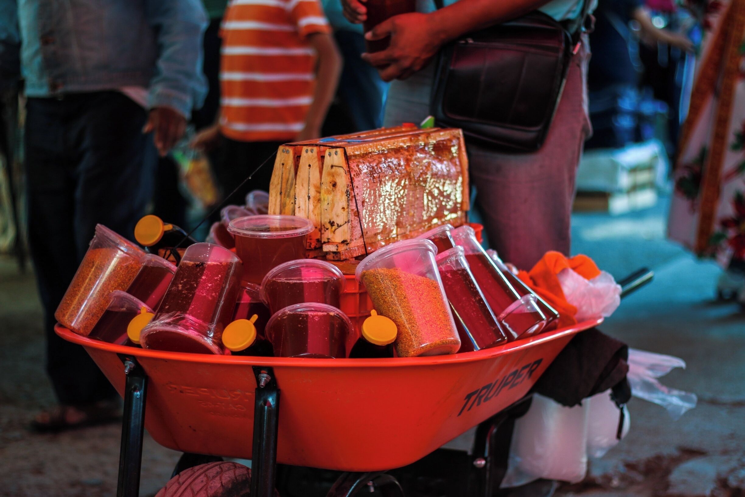 The Sunday market in Tlacolula, about a 15 minute bus ride outside of Oaxaca City for around 20pesos. It's huge, and a great place to meet some locals and buy some great food and wares. 

This guy was selling incredibly delicious honey out of his wheelbarrow, complete with honeycombs!