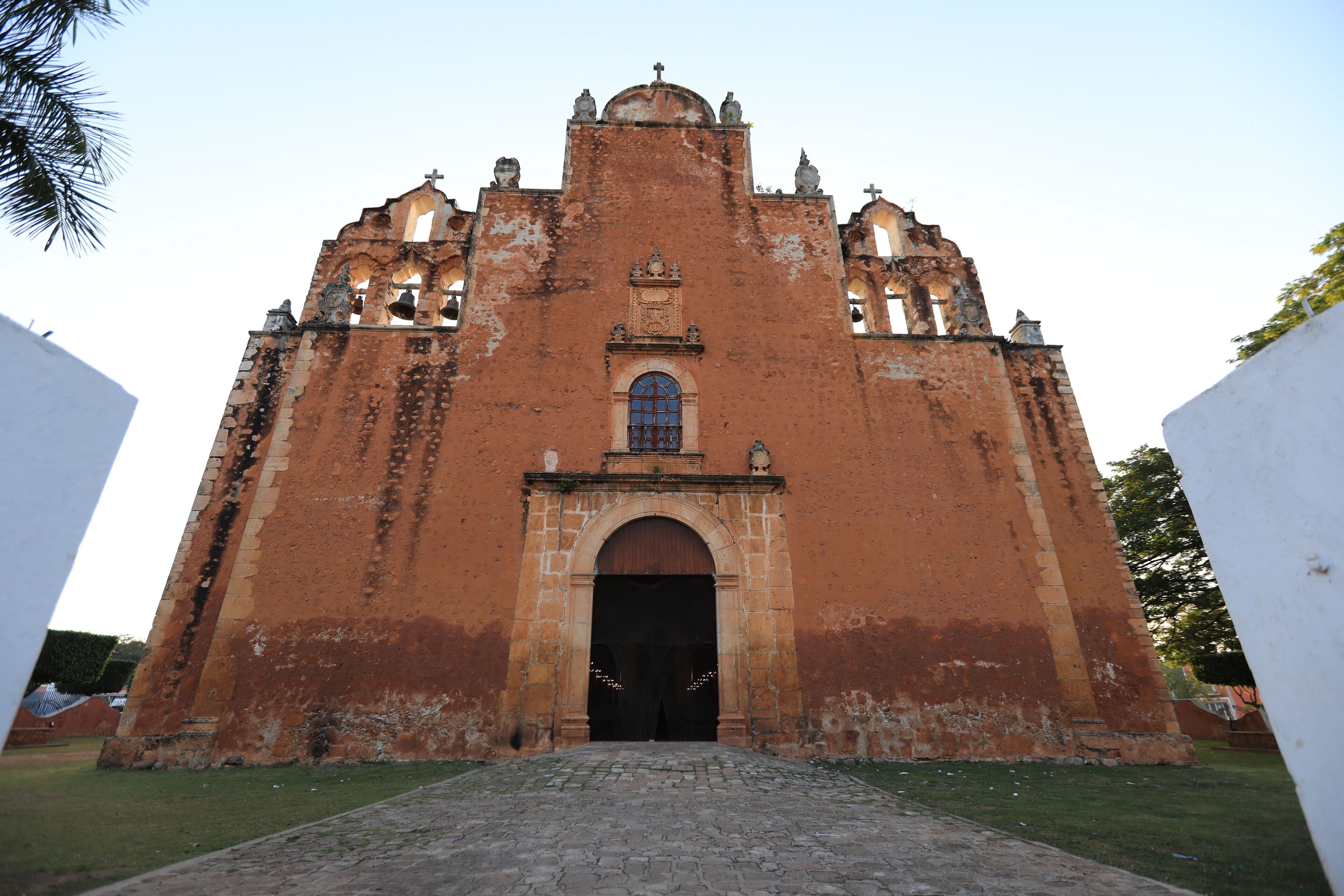 A large, historic church with a prominent arched entrance and multiple bell towers.