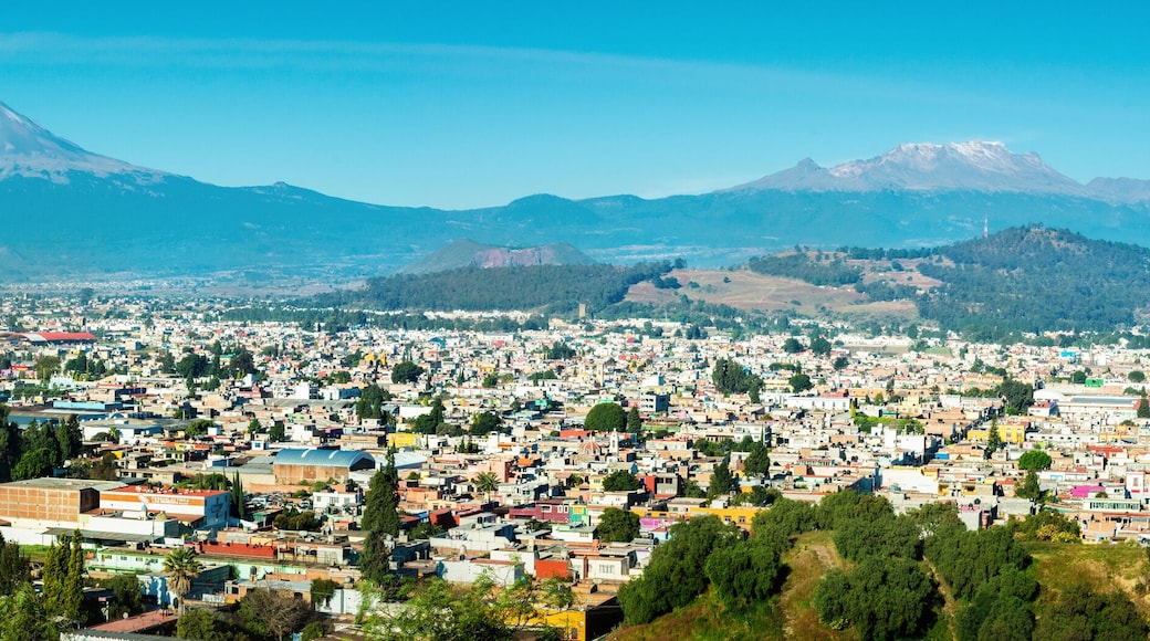 Eruption of Popocatepetl Volcano over the town of Puebla, Mexico, panoramic view