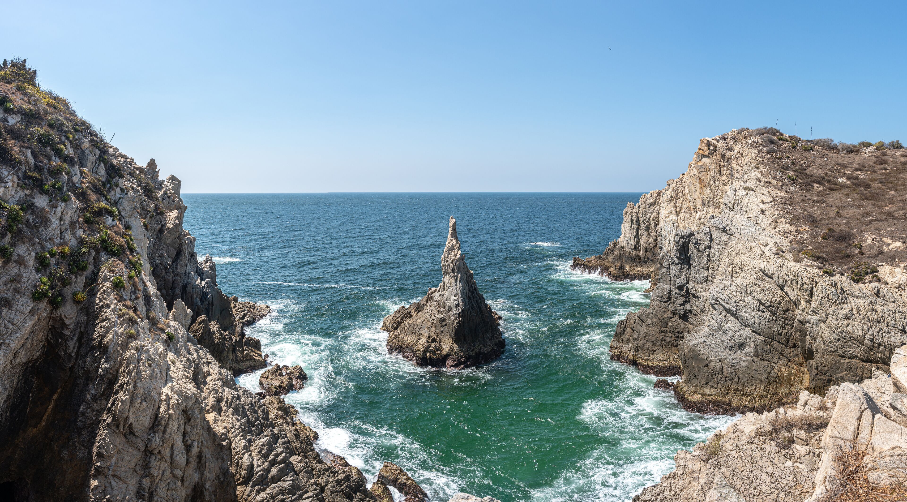 Maruata Beach in the municipality of Aquila, Michoacan, Mexico. el dedo de Dios rock (the finger of God)