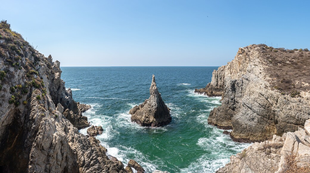 Maruata Beach in the municipality of Aquila, Michoacan, Mexico. el dedo de Dios rock (the finger of God)