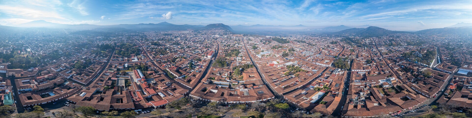 Aerial: Patzcuaro panoramic view of the landscape and cityscape. Drone view