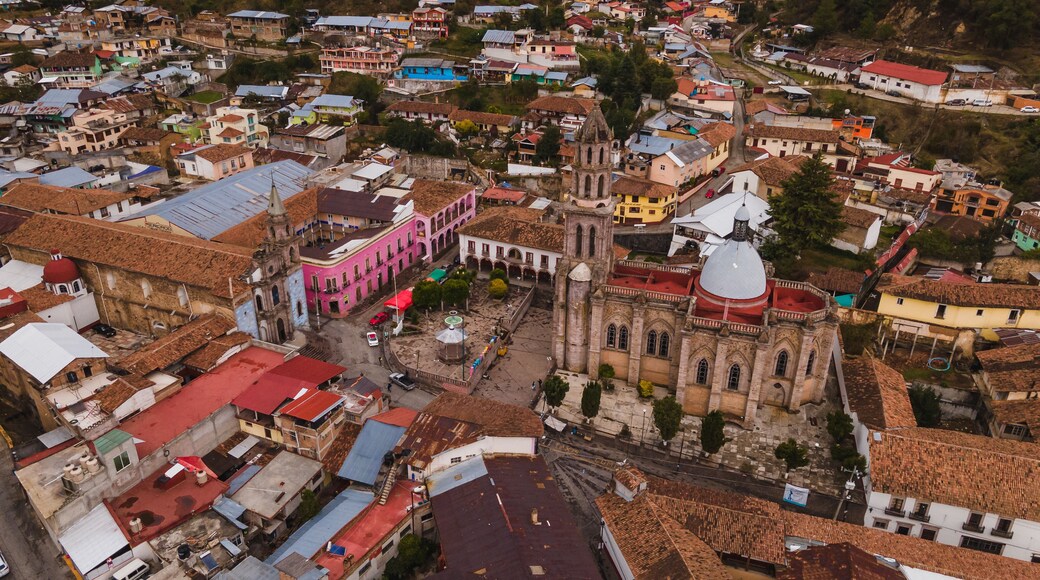 Aerial photographs of the exteriors, details of the Cathedral of Angangueo, Michoacan, Mexico, as well as some houses and old buildings of the town.