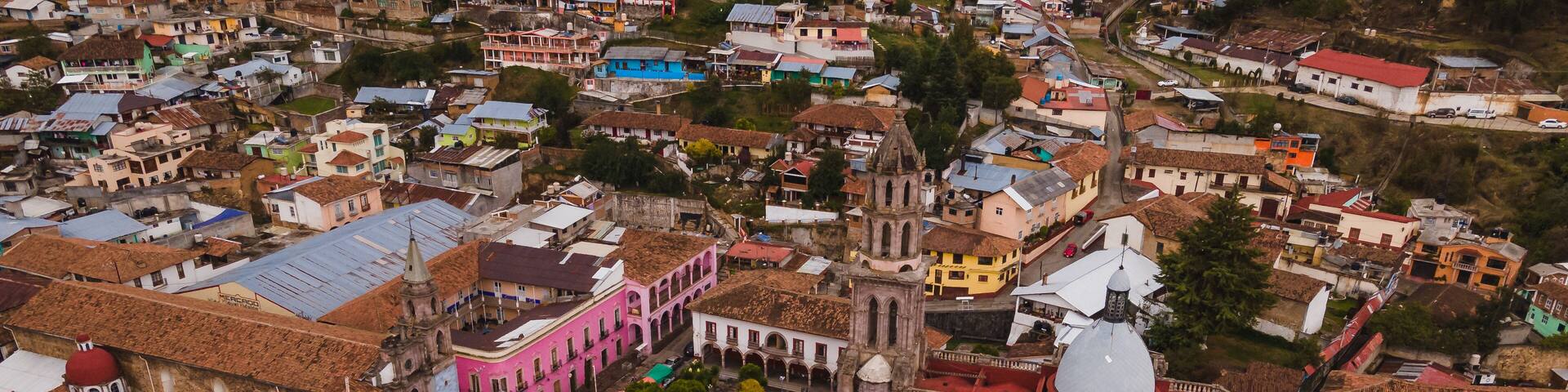 Aerial photographs of the exteriors, details of the Cathedral of Angangueo, Michoacan, Mexico, as well as some houses and old buildings of the town.