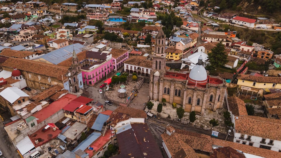 Aerial photographs of the exteriors, details of the Cathedral of Angangueo, Michoacan, Mexico, as well as some houses and old buildings of the town.