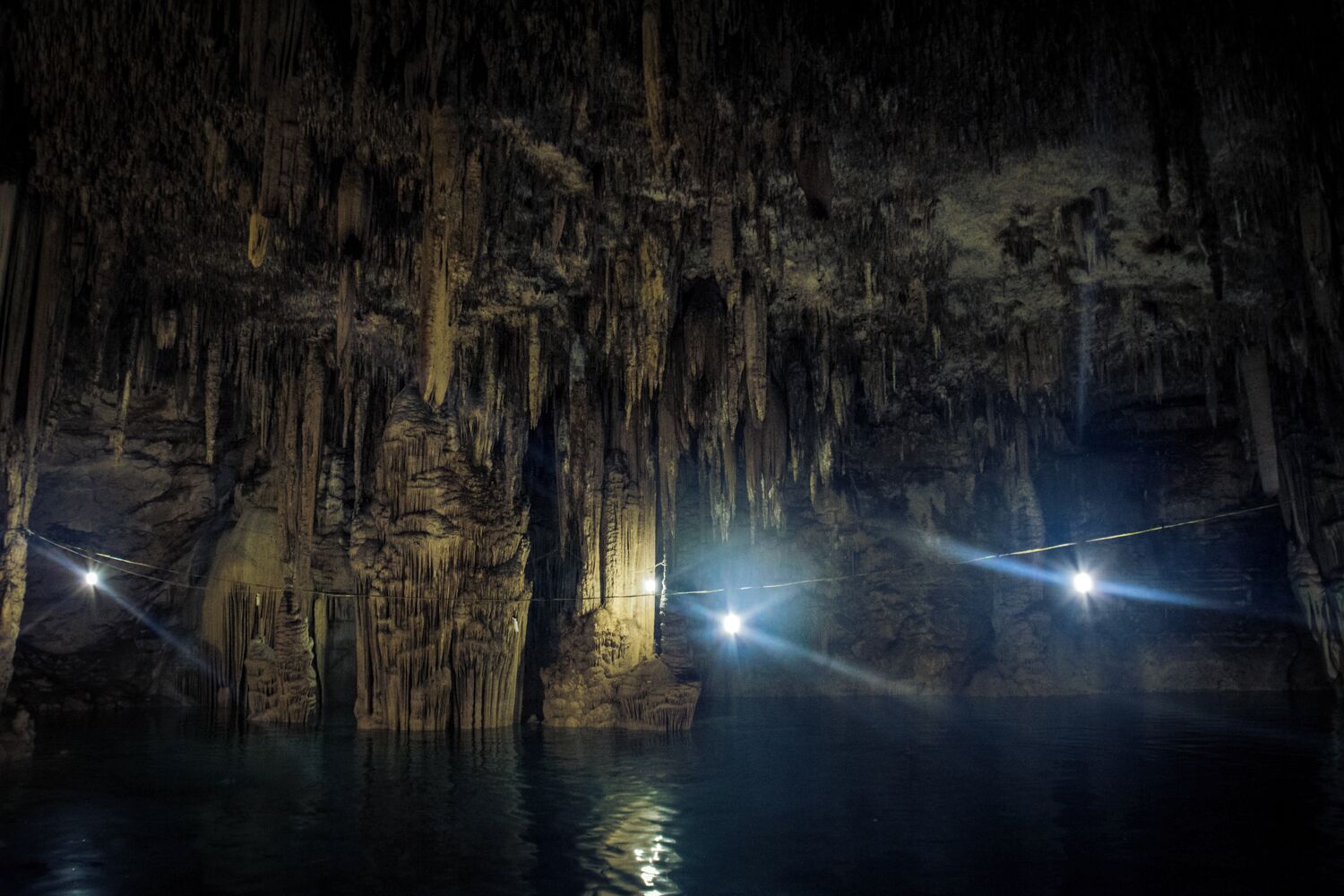 Huge columns of rock come up from the bottom of Choj Ha, near the town of Xcan.