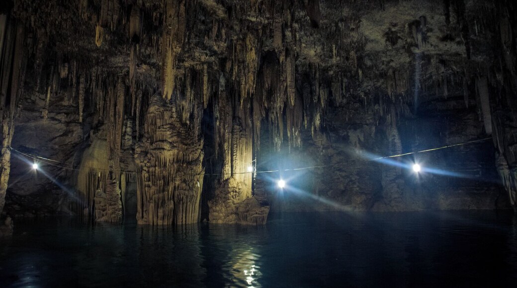 Huge columns of rock come up from the bottom of Choj Ha, near the town of Xcan.