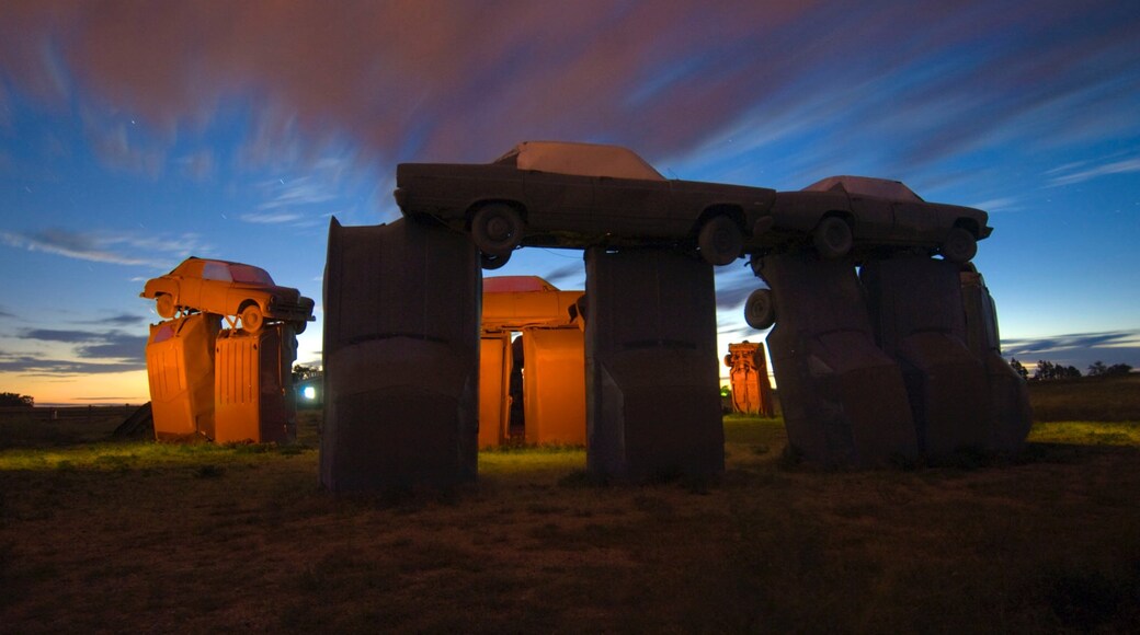 Eastern Nebraska featuring art, a sunset and a monument