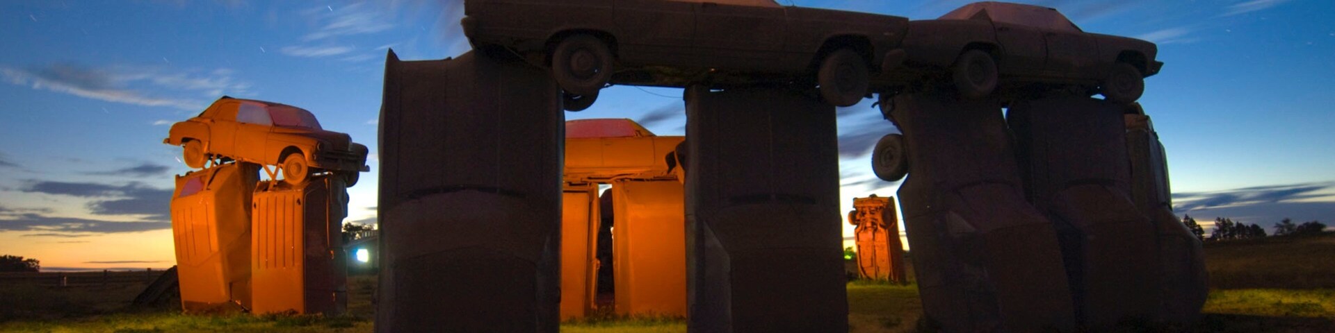 Eastern Nebraska featuring art, a sunset and a monument