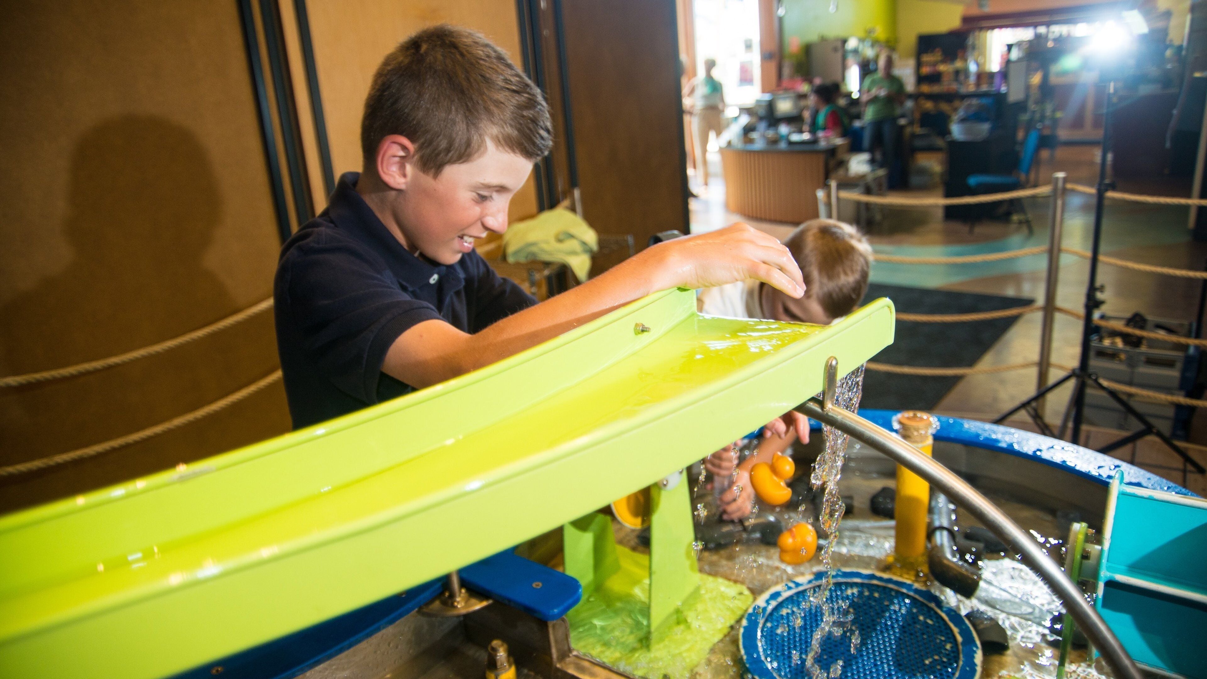 Exploration Works showing interior views as well as an individual child