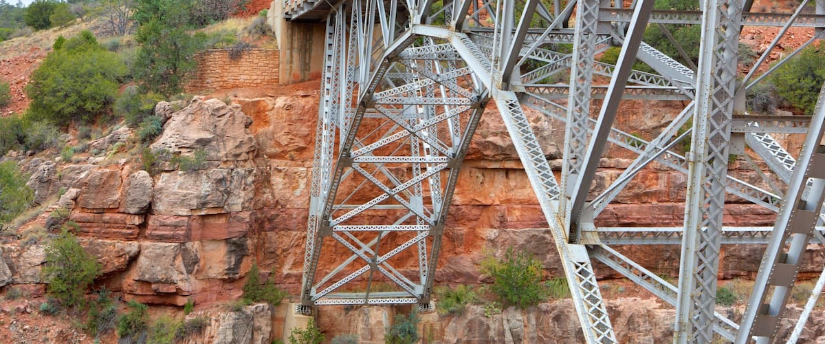 Sedona showing a gorge or canyon and a bridge