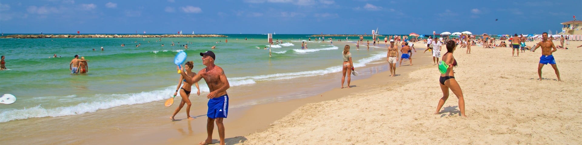 Tel Aviv which includes a beach, swimming and general coastal views