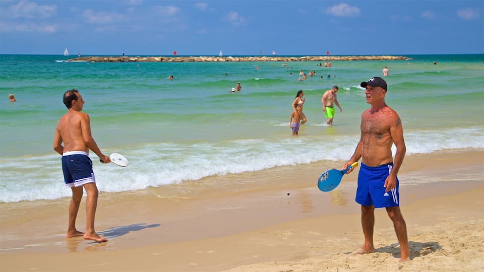 Tel Aviv showing swimming, general coastal views and a sandy beach