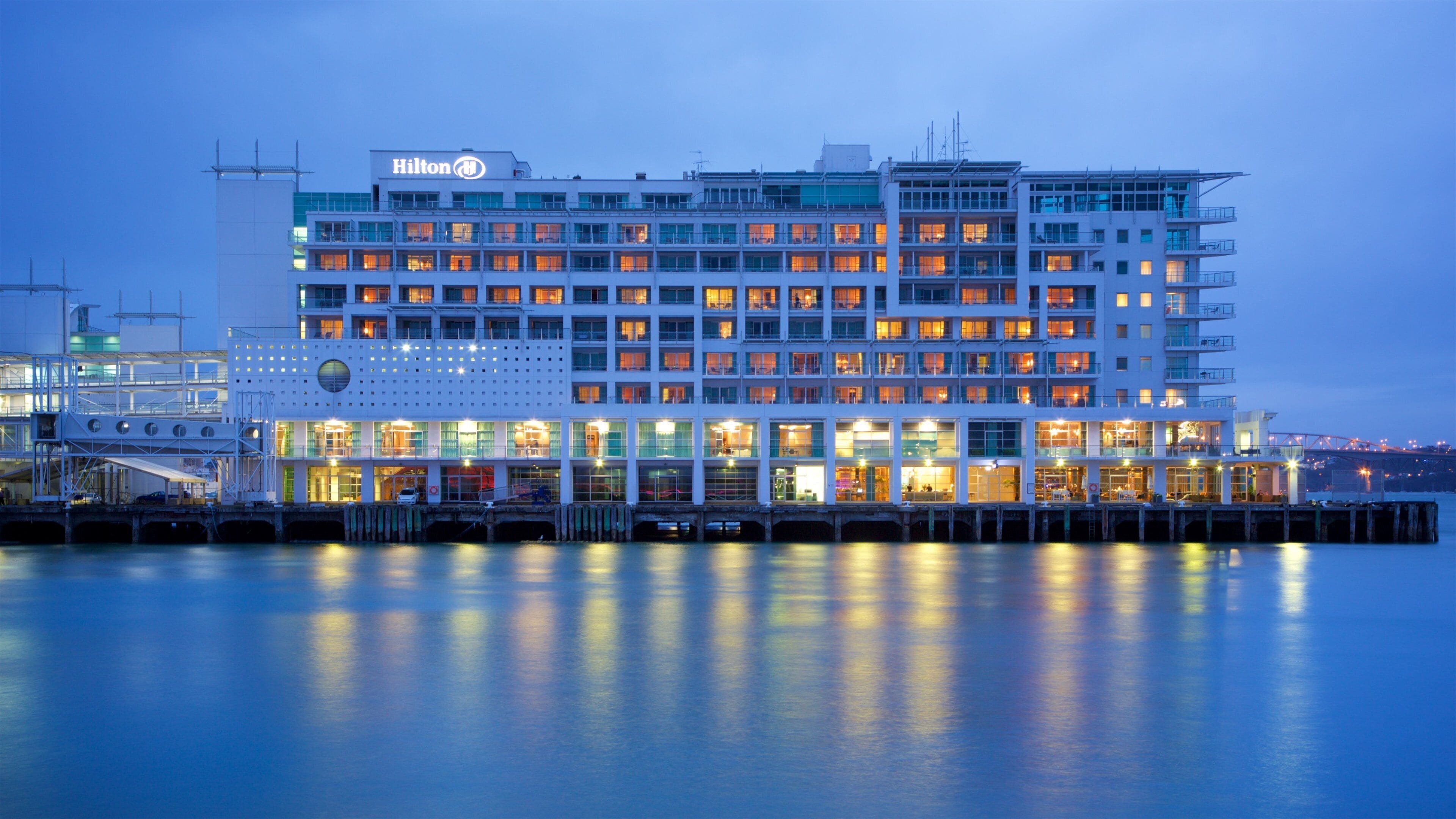 Queens Wharf showing night scenes and a bay or harbor