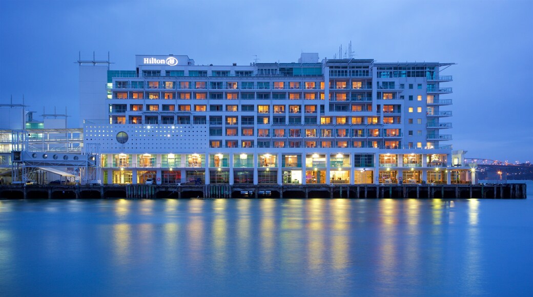 Queens Wharf showing night scenes and a bay or harbor
