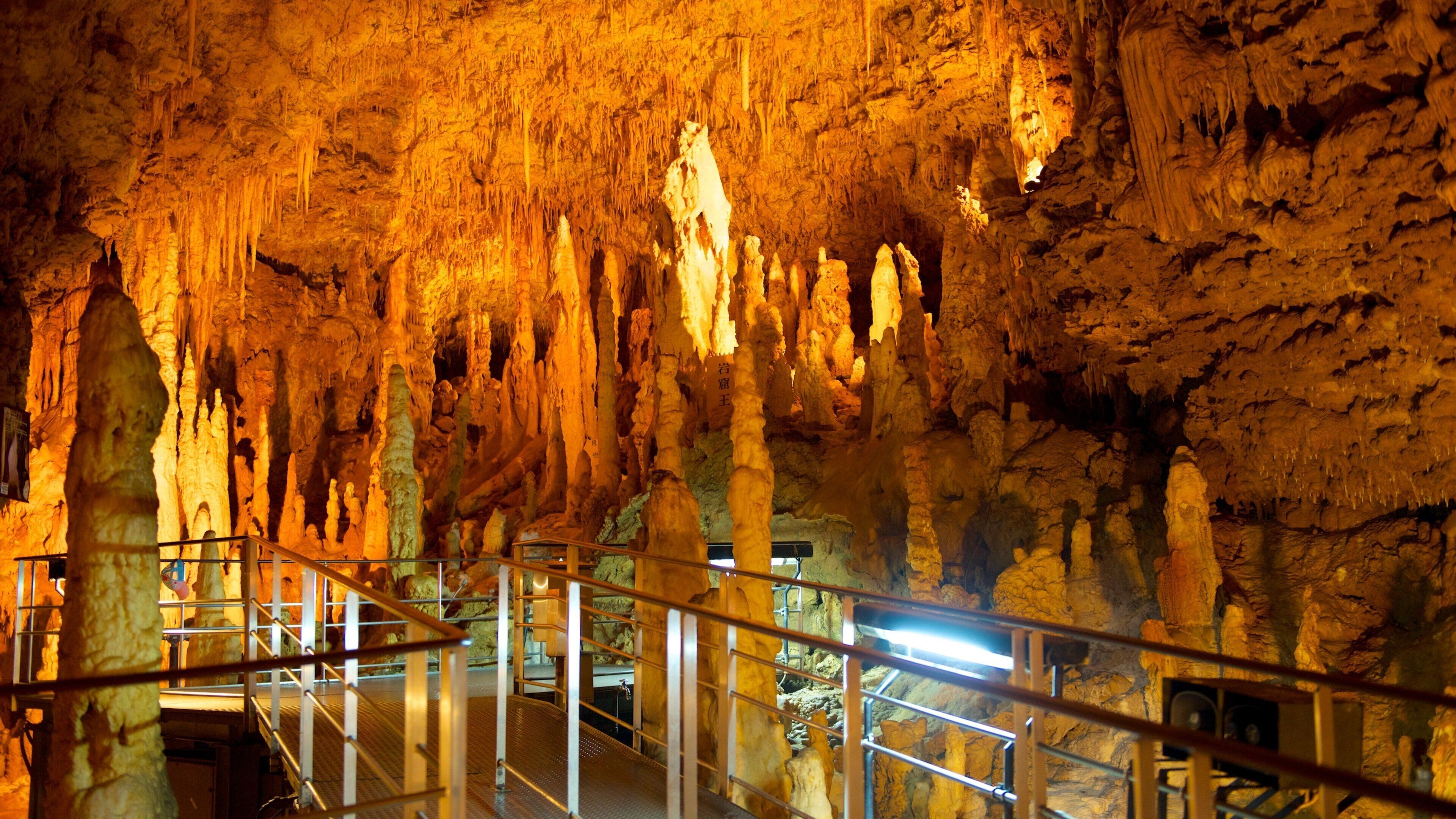 Okinawa featuring interior views, a bridge and caves