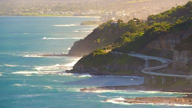 A coastal highway winding along a cliffside, overlooking the ocean.