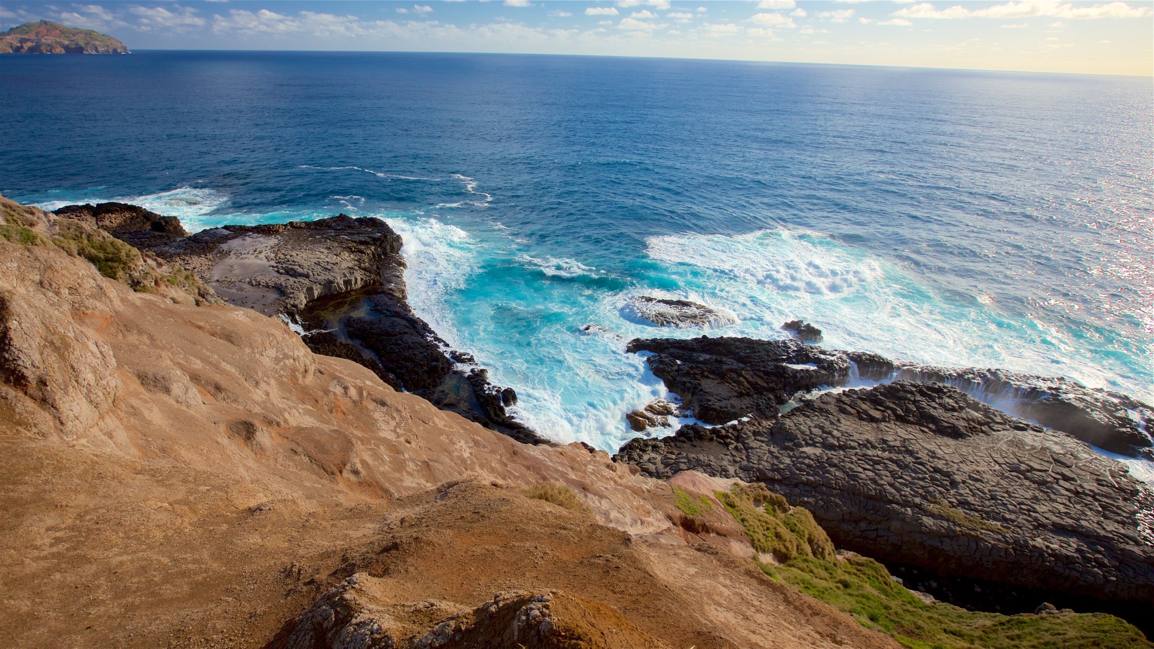 Norfolk Island which includes rocky coastline and general coastal views